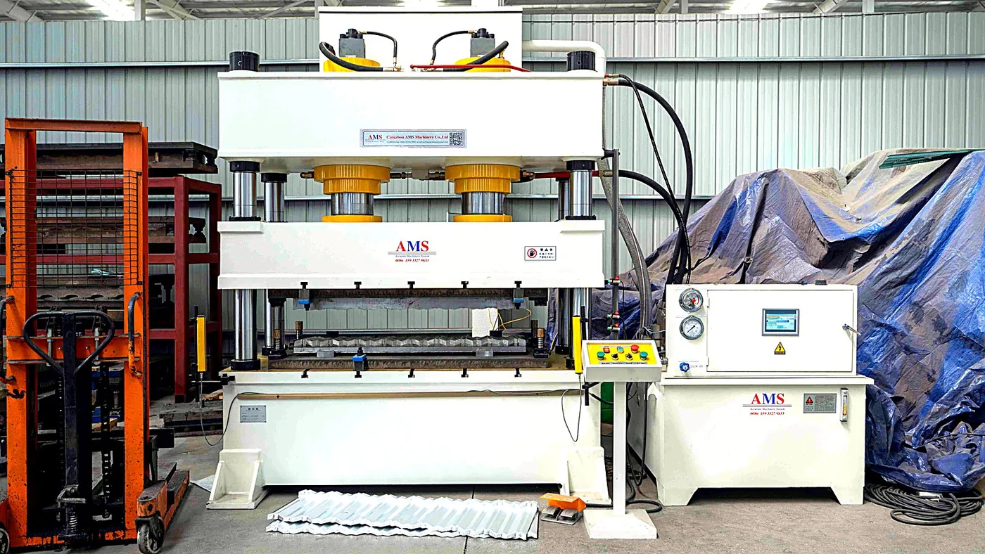 Roll-forming and pressing section of the stone-coated tile line